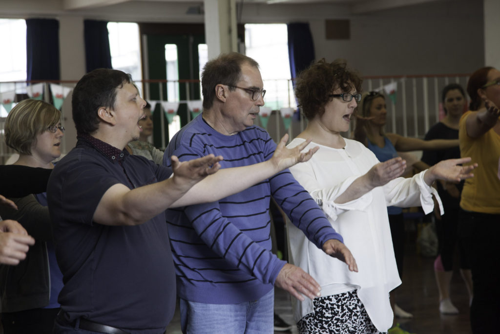 Scottish Power sponsors of the Llangollen Eisteddfod Inclusion Project who will be performing at the Llangollen Eisteddfod . Pictured are Wyne Driscoll, Mark Hinton and Jane Harper during rehearsals .