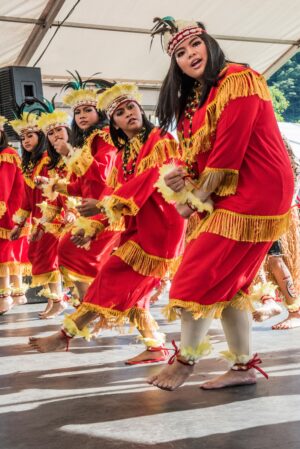 Girls in traditional dress dancing